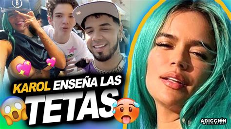 enseñando las tetas en publico|Wow Karol G enseña ''LAS TETAS'' en Publico / Anuel  .